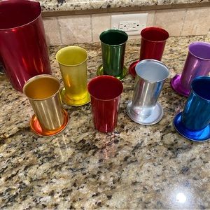 Aluminum Pitcher, 8 Aluminum Glasses and 7 Aluminum Saucers